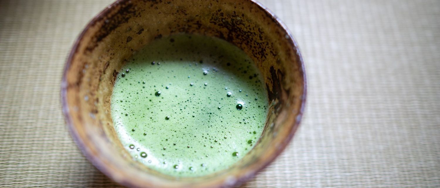 Matcha whisked in a tea bowl